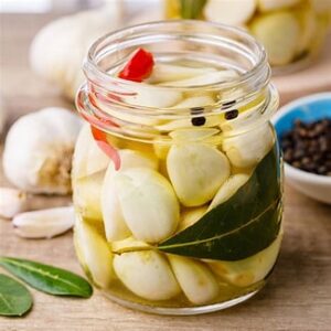 Pickling garlic cloves in vinegar or brine can mellow their sharpness. It is good and improve the taste of meals in daily life.