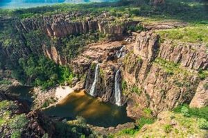 Another picturesque waterfall can be reached by a 4WD trek and boat shuttle in the dry season. 