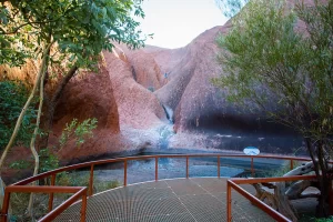 Located near Uluru, this tranquil waterhole is not only a beautiful natural feature but also holds cultural significance for the Anangu people. Take a guided tour to learn about its history and significance.