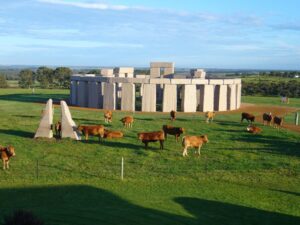 Visit the intriguing replica of the ancient Stonehenge monument, constructed with pink granite, and delve into its mysterious history and significance.