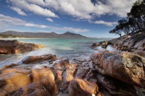 A secluded gem within the park, Hazards Beach offers a tranquil setting for beachcombing and picnicking, with stunning views of the rugged Hazards mountain range.