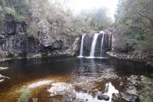 The Pencil Pine Falls and Knyvet Falls circuit showcases the park's stunning waterfalls, lush vegetation, and provides a peaceful escape for nature enthusiasts.