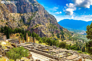Delphi, Greece, is a historic sanctuary nestled on Mount Parnassus. Home to the legendary Oracle of Apollo, it offers visitors ancient ruins, a spectacular amphitheater, and stunning views of historical sites for tourists in the surrounding landscape.