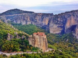 Greece, reveals historical sites, a surreal landscape of towering rock formations crowned with ancient monasteries for tourists. Experience awe-inspiring vistas and spiritual serenity in this UNESCO World Heritage Site.