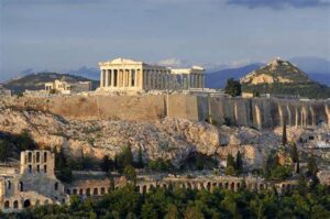 Iconic ancient citadel overlooking Athens, home to Parthenon, Erechtheion, and other historical sites for tourists, a symbol of Greek civilization.