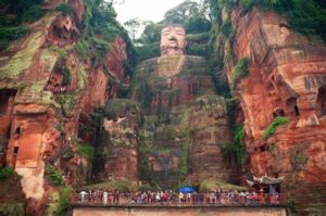 Situated in Sichuan Province, this massive stone statue of Buddha is carved into a cliff overlooking the confluence of three rivers.