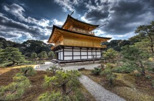 Also known as the Golden Pavilion, Kinkaku-ji is a stunning Zen temple covered in gold leaf. The reflection of the temple in the surrounding pond creates a picturesque scene that attracts visitors from around the world.