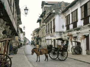 One of the UNESCO World Heritage and Historical Sites, Vigan Philippines is a well-preserved Spanish colonial town with cobblestone streets, ancestral houses, and horse-drawn carriages that transport tourists back in time.