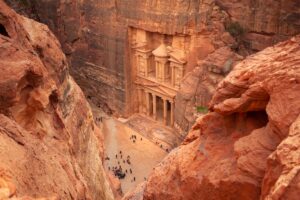 Known as the "Rose City," Petra is a UNESCO World Heritage Site and one of Jordan's most famous historical landmarks. Carved into pink sandstone cliffs, this ancient city features impressive structures such as the Treasury, the Monastery, and the Royal Tombs.