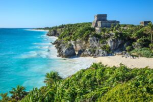 Situated on the Caribbean coast, Tulum is a walled Mayan city overlooking the turquoise waters of the Caribbean Sea.