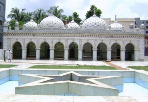 A beautiful mosque in Dhaka, known for its striking star motifs and intricate mosaic work, reflecting a blend of Mughal and modern architectural styles.