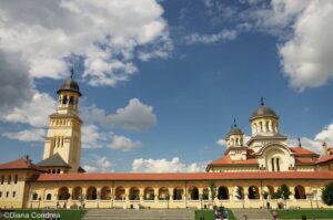 The Alba Iulia Citadel, located in the city of Alba Iulia, is an impressive star-shaped fortress that played a significant role in Romanian history. It is associated with the Great Union of 1918 when Transylvania united with Romania. The citadel includes several historic buildings, museums, and the Coronation Cathedral.