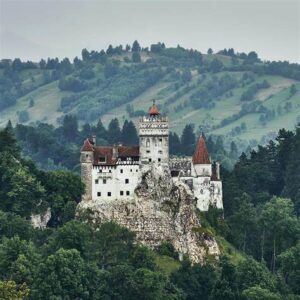 Often referred to as "Dracula's Castle," Bran Castle is located near Bran in the Transylvania region. It is a national monument and landmark in Romania, associated with the Dracula legend and the historical figure Vlad the Impaler. The castle features gothic architecture and houses a museum displaying art and furniture collected by Queen Marie.