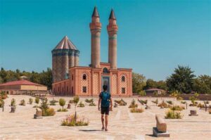 Located in the exclave of Nakhchivan, this 12th-century mausoleum is renowned for its intricate brickwork and geometric patterns. It is considered one of the finest examples of medieval Azerbaijani architecture.