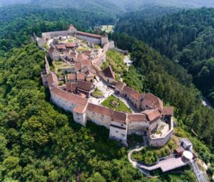 Situated on a rocky hilltop near the town of Râșnov, this medieval fortress was built as a defense against invading forces. The fortress offers stunning views of the surrounding area and provides a glimpse into Romania's feudal history.