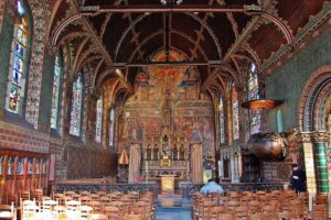 Located in Bruges, this 12th-century basilica is renowned for housing a revered relic of the Holy Blood, believed to be a drop of Christ's blood, and boasts stunning Romanesque and Gothic architecture.