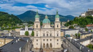 This 17th-century Baroque cathedral in Salzburg is famous for its stunning interior, impressive organ, and historical significance as the site of Mozart's baptism.