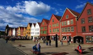 Bryggen, the old wharf of Bergen, is a UNESCO World Heritage Site known for its colorful wooden buildings lining the harbor.These structures date back to the Hanseatic League, reflecting the importance of Bergen as a trading center in medieval times.