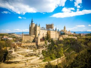 The Alcazar of Segovia is a medieval fortress and royal palace with a distinctive fairy-tale-like appearance, offering panoramic views of the city.