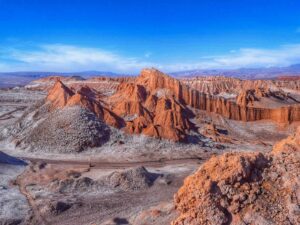 Known as the driest desert in the world, the Atacama features otherworldly landscapes, salt flats, and geysers, making it a unique destination for stargazing and exploring its surreal terrain.