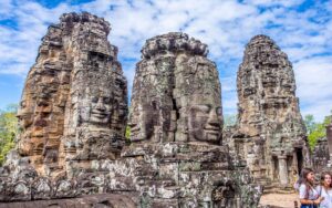 Located in the heart of Angkor Thom, Bayon is famous for its 216 serene and massive stone faces of Avalokiteshvara. The temple's unique design and detailed bas-reliefs depict historical events and daily life in the Khmer Empire.