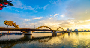 Known for its sandy beaches and the iconic Marble Mountains, Da Nang is a modern city that offers a mix of relaxation and adventure. The Golden Bridge, held up by giant stone hands, is a must-see attraction that provides stunning views of the surrounding area.