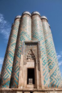 Located in the exclave of Nakhchivan, this 12th-century mausoleum is renowned for its intricate brickwork and geometric patterns. It is considered one of the finest examples of medieval Azerbaijani architecture.