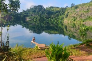 This area offers a mix of historical significance and natural beauty, with lush hills and abandoned mining sites. The view from the top is panoramic, showcasing Liberia’s countryside.