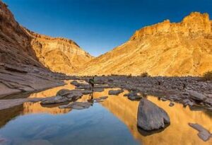 Fish River Canyon is one of the largest canyons in the world, offering dramatic views of its deep, rugged landscape. The area is a geological marvel, with unique rock formations and a rich history of ancient erosion.